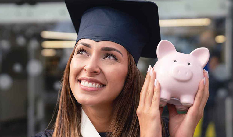 Girl wearing a black convocation gown and long graduation hat, representing SLB Founder Scholarship