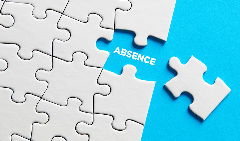 One block separated from a group of connected blocks, symbolizing absence