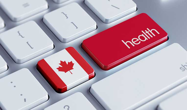 Keyboard with a red Enter key labeled 'Provincial Health' and a red Canadian flag next to it